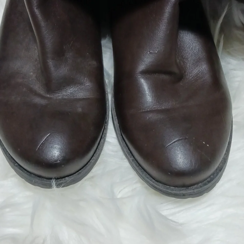 9&Co size 8 brown tall boots, with decoractive buckles. Man made materials.